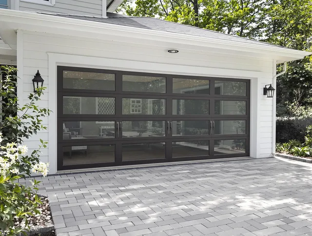 Fort Carson Garage Door Repair design specialist presenting custom garage door options to Fort Carson homeowner