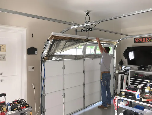 Garage door section replacement by Fort Carson Garage Door Repair in Fort Carson