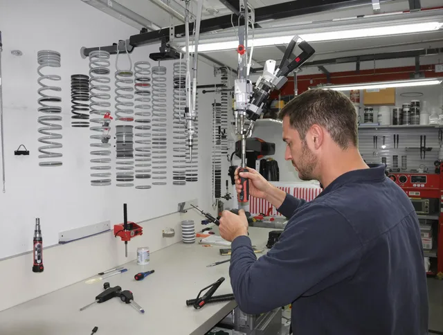 Fort Carson Garage Door Repair safety certified technician performing precision spring replacement in Fort Carson