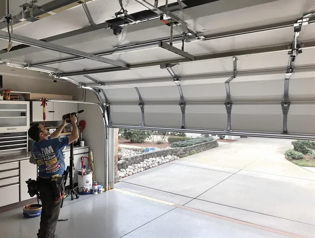 Garage door track repair service by Fort Carson Garage Door Repair in Fort Carson